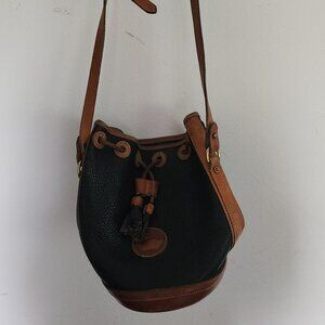 Dooney & Bourke black and cognac leather bucket bag